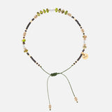 Mantra Harmony Deluxe – Eleganter Kristallschmuck auf weißem Hintergrund.